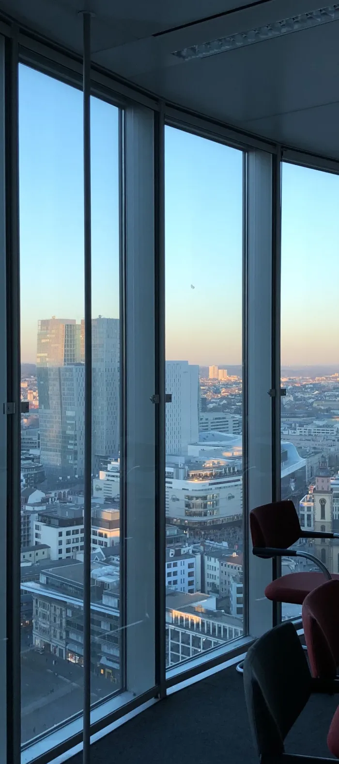 a room with a table and chairs