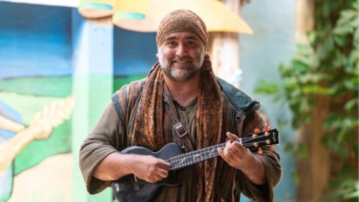 a man playing a guitar