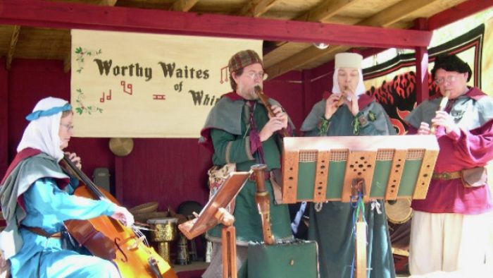 a group of people playing instruments