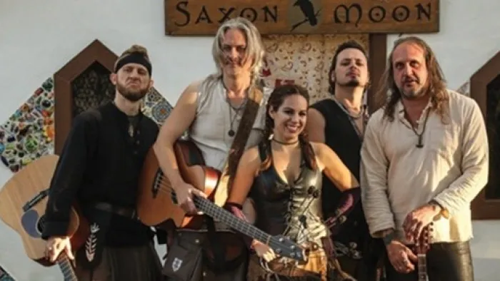 a group of men holding guitars