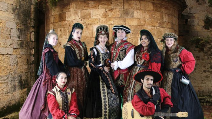 a group of people posing for the camera
