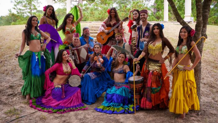 a group of people in colorful dresses