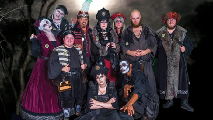 a group of people posing for a photo