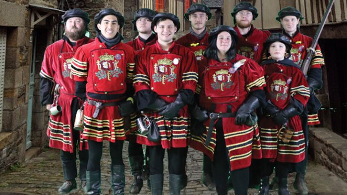 a group of people posing for the camera