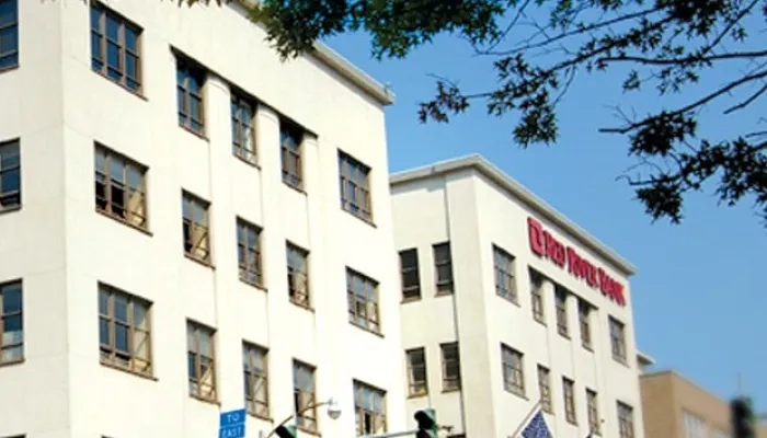a building with a flag on the roof