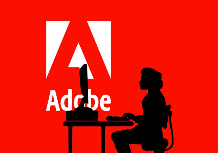 Silhouette of a graphic artist creating an artwork file
