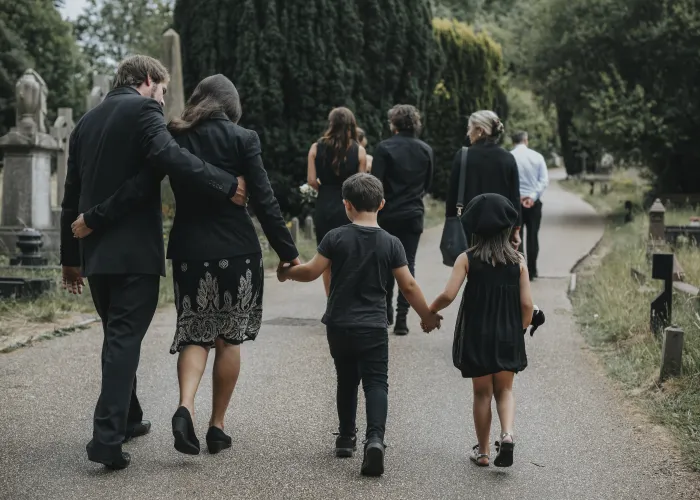 a group of people walking down the street