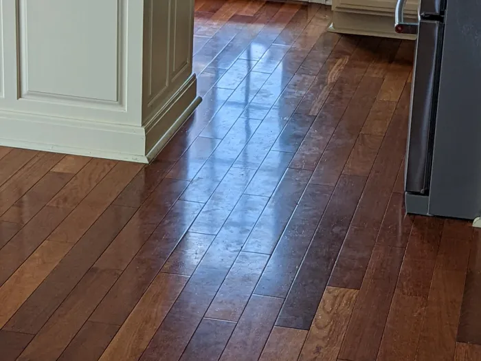 a wood floor in a kitchen