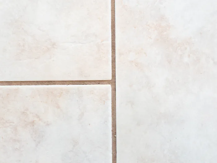 a close-up of white tile with clean grout lines after Zerorez cleaned it