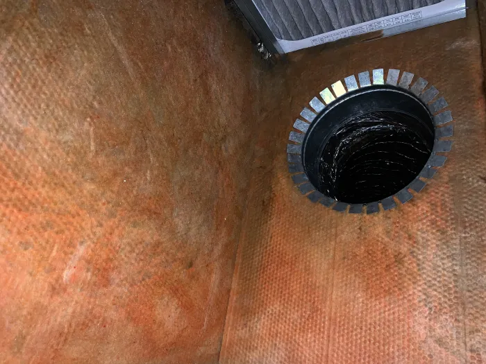 inside look of a fiberglass HVAC system, free of dust covering the floor and sides as it was professionally cleaned by Zerorez