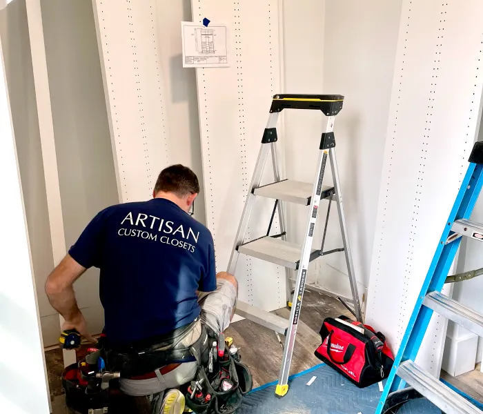 a man painting a wall