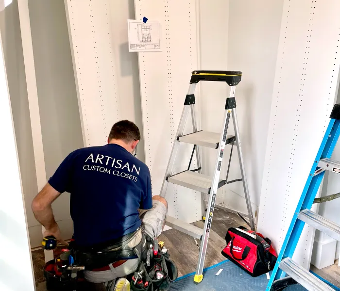 a man painting a wall