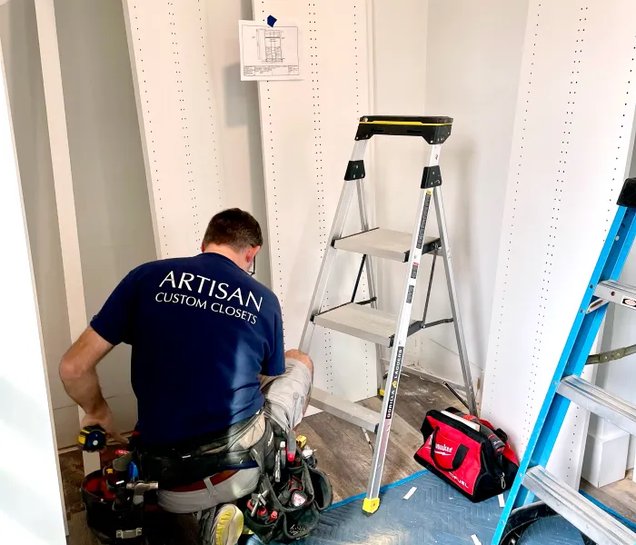 a man painting a wall