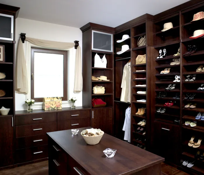 a room with a table and shelves