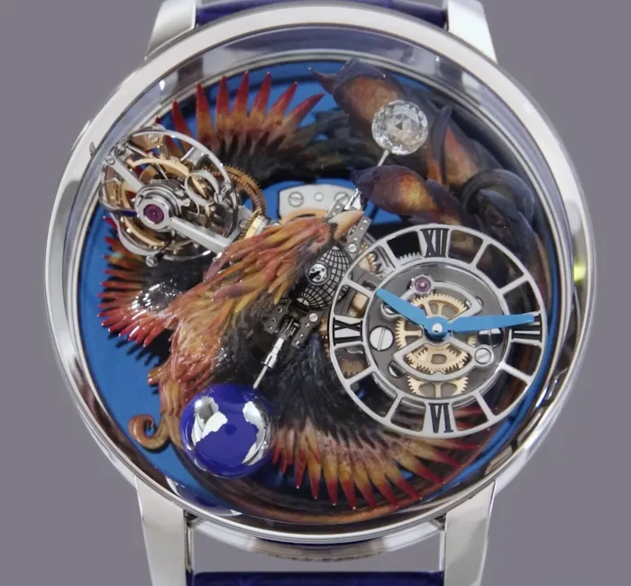 a silver watch with a colorful design