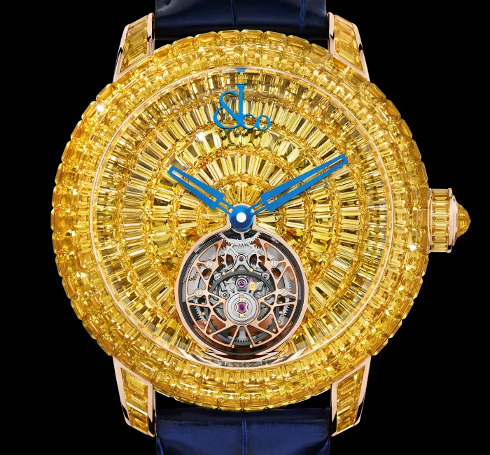 a gold watch with a blue face