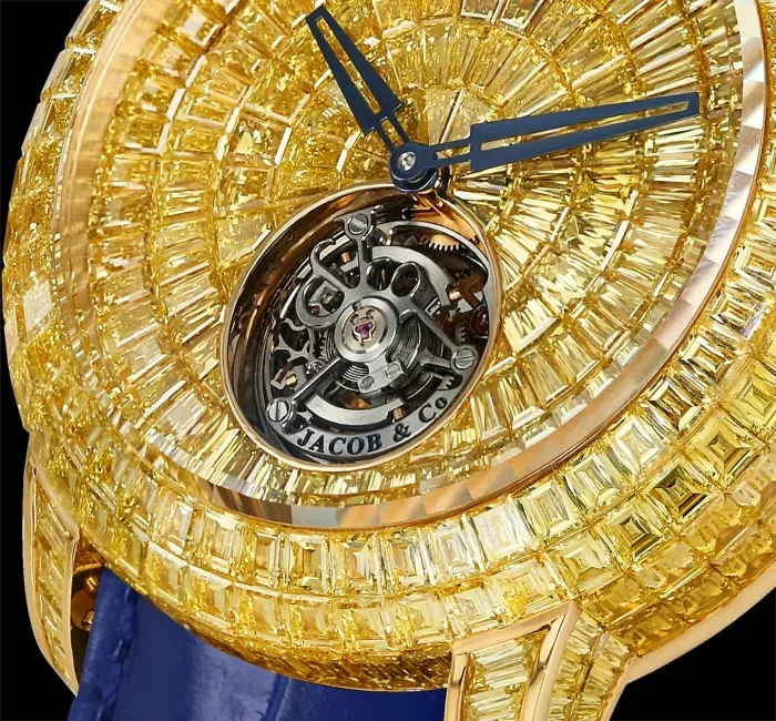 a clock with a couple of knives on it