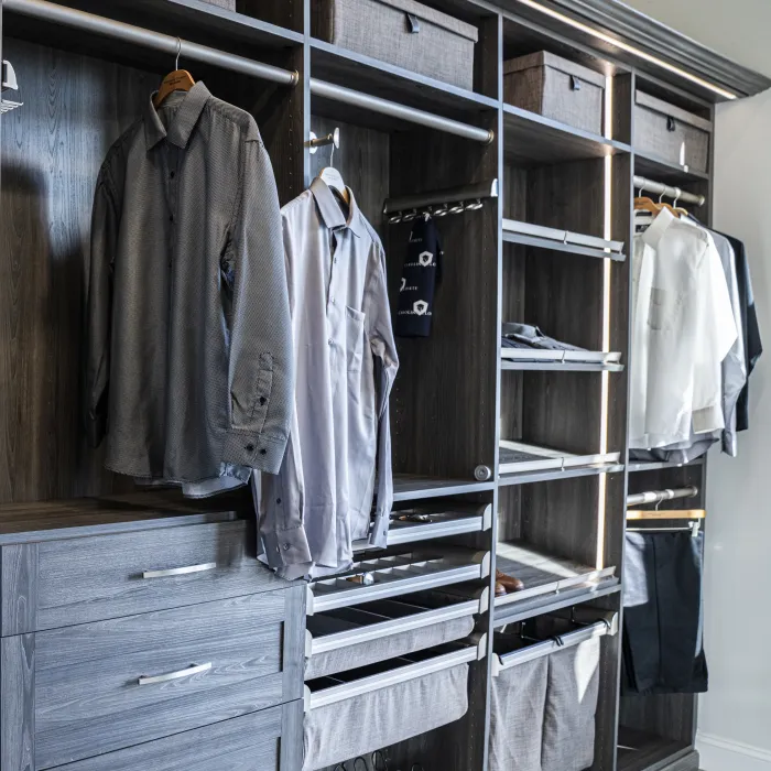 a closet with clothes