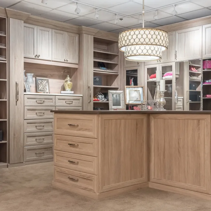 a kitchen with wooden cabinets