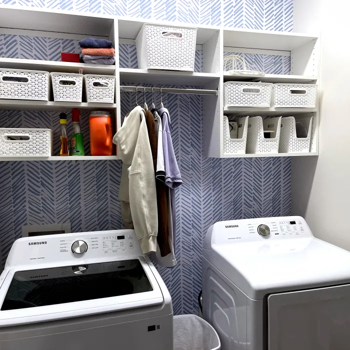 a laundry room with a washer and dryer