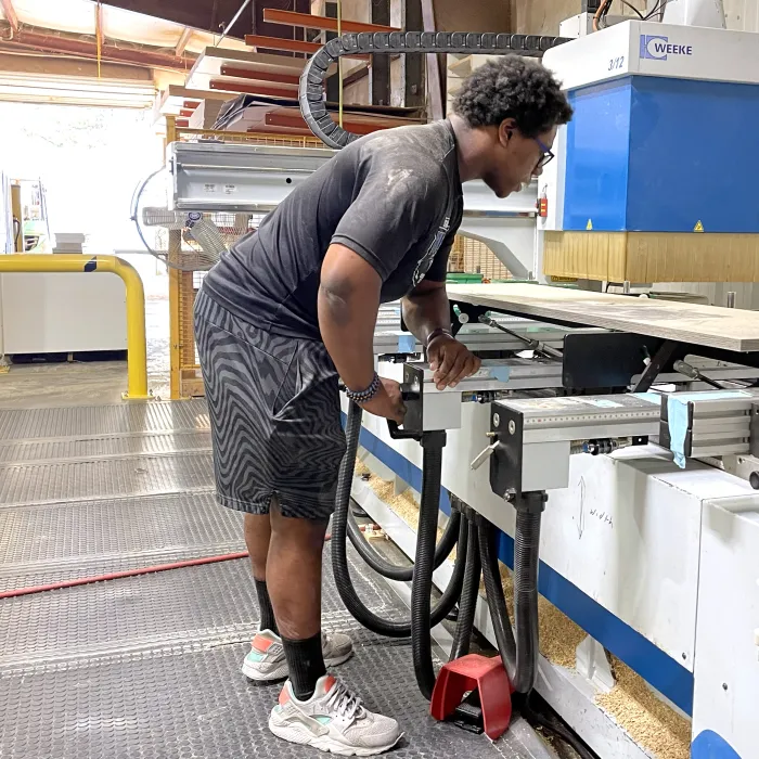 a man working on a machine in the carolina closets plant in anderson South Carolina