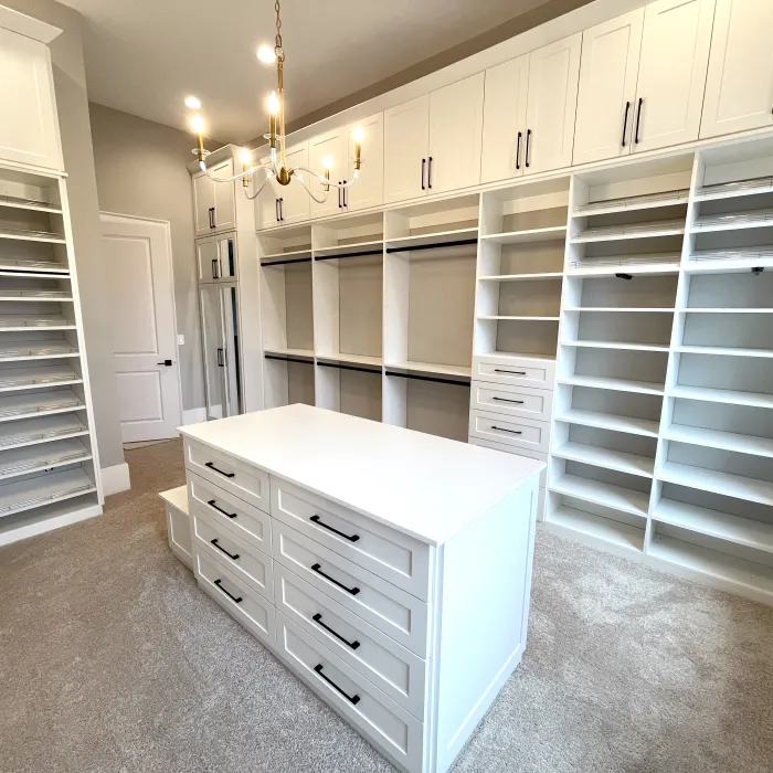 a white kitchen with white cabinets