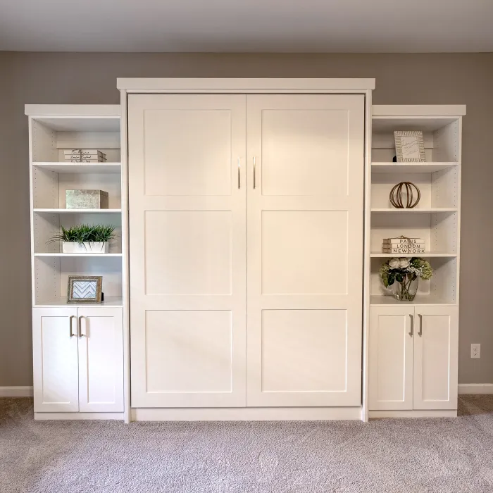 a white cabinet with shelves