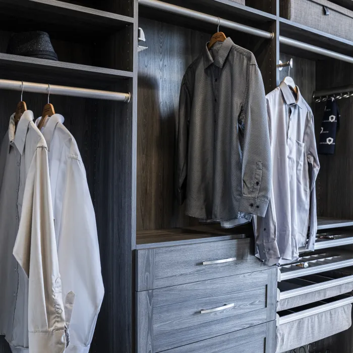 a closet with clothes