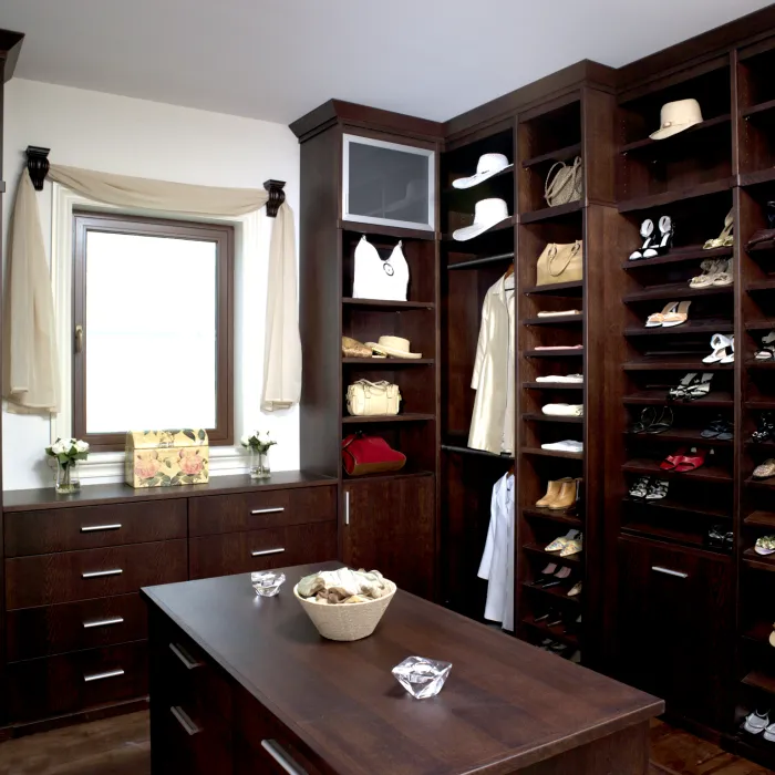 a room with a table and shelves