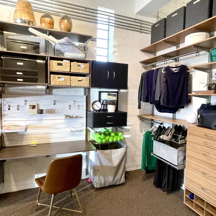 a room with shelves and a desk