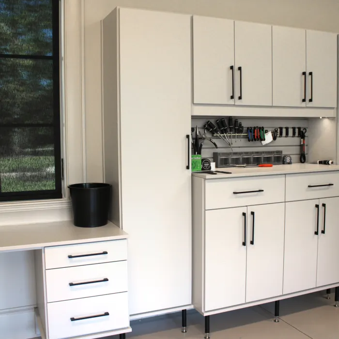 a kitchen with white cabinets