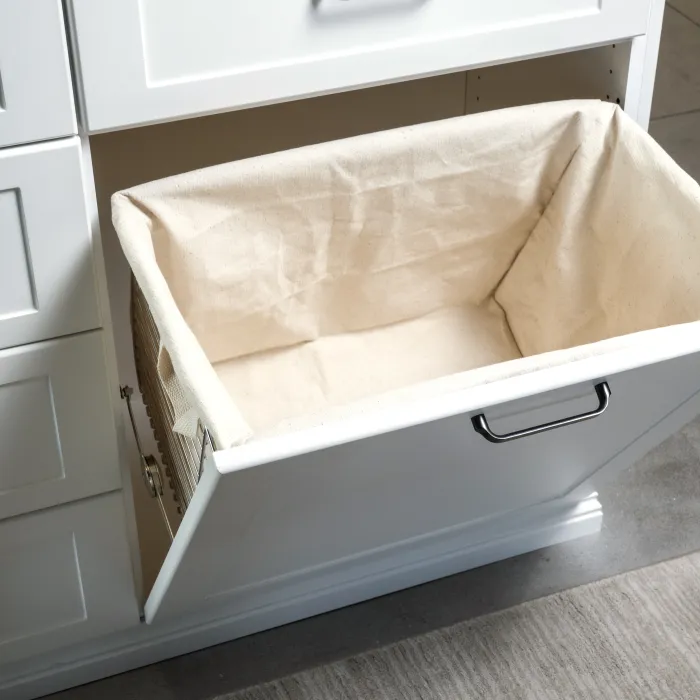 a white rectangular box with a white lid on a tile floor