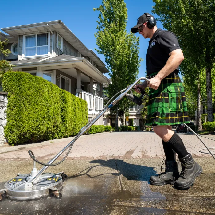 a man holding a hose