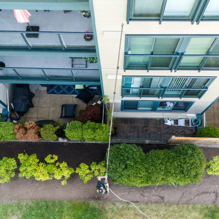 a person washing a building