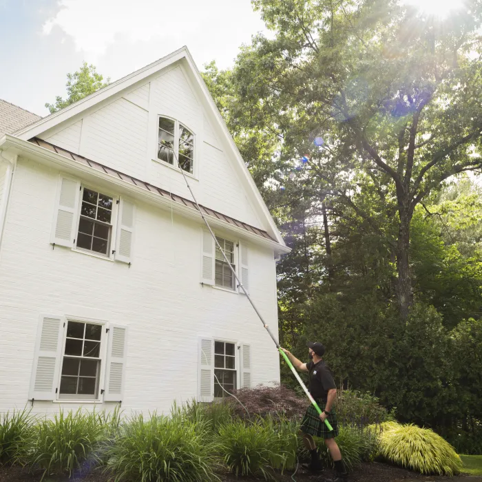 a person standing in front of a house