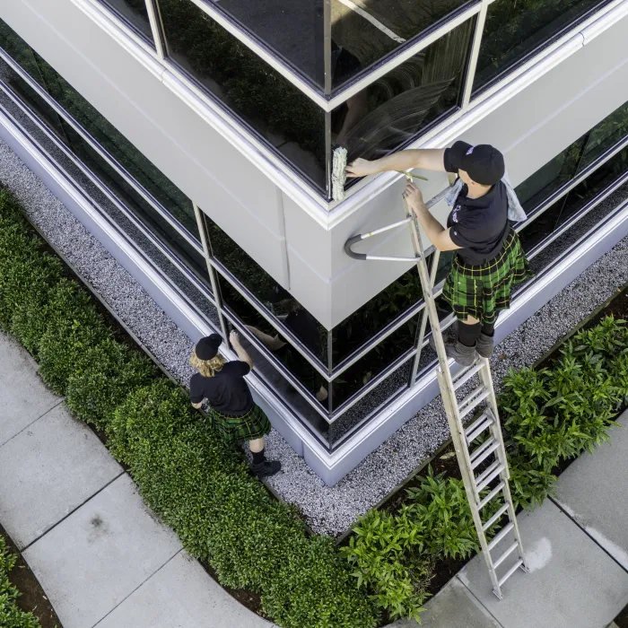 a couple of people outside a building