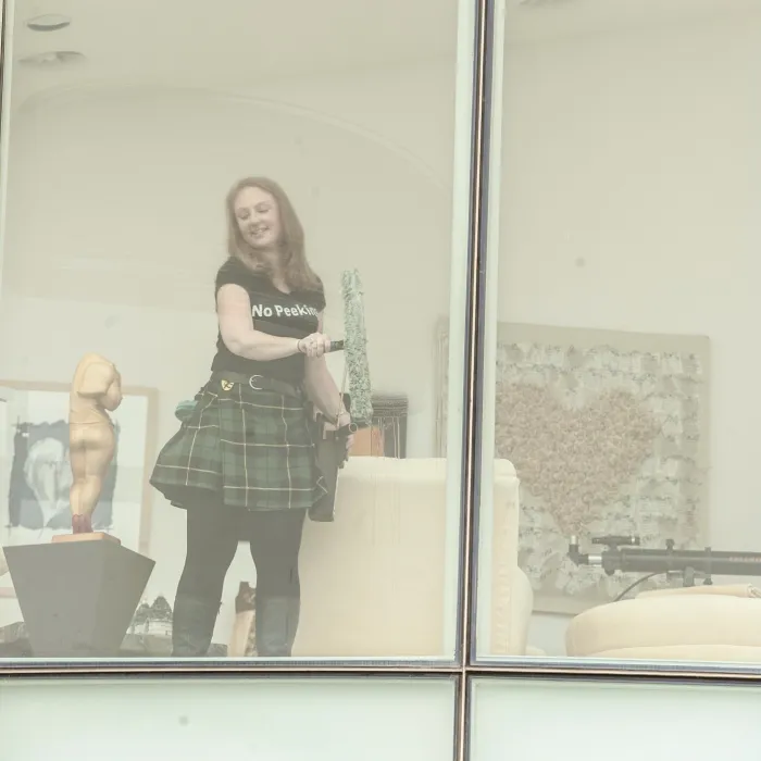 a person standing in front of a window