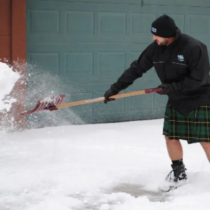 a person shoveling snow