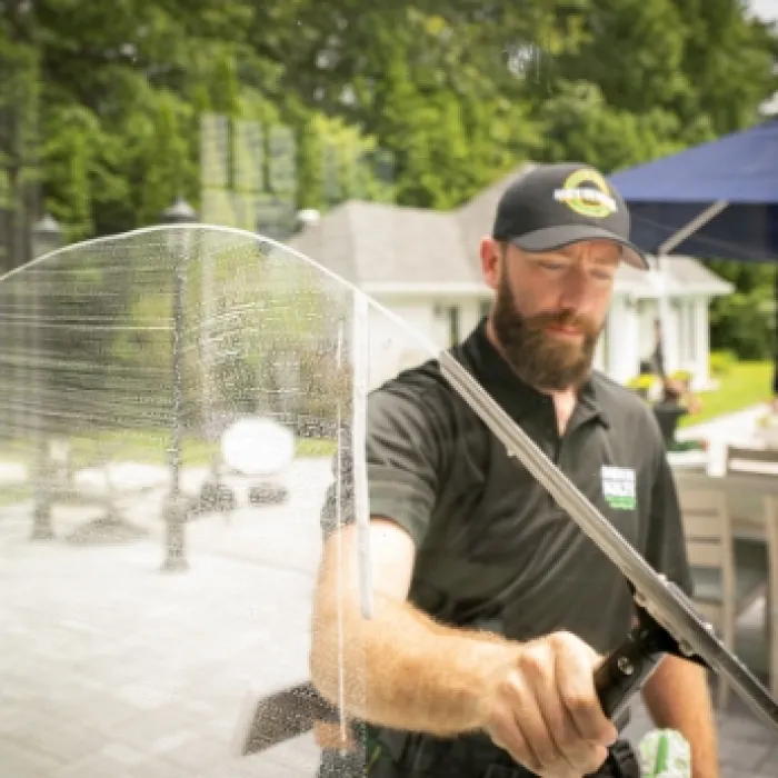 a man cleaning windows