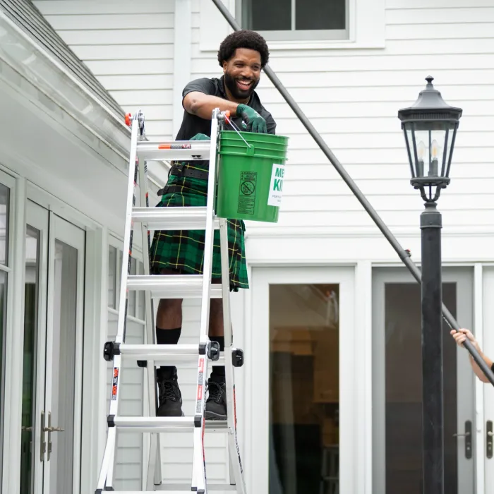 Alan Branch et al. on a ladder