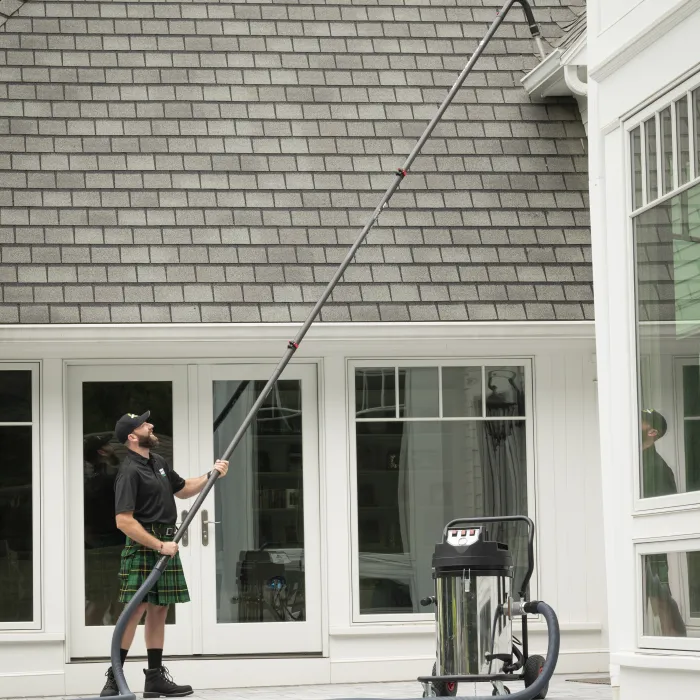 a man holding a large pole