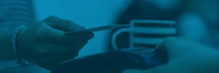 a person holding a credit card