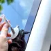 a person holding a white object
