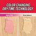 Color changing dry-time paint swatch that starts pink and dries to a natural beige on wood background.