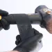 a person wearing gloves and a mask
