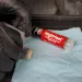 a person holding a can