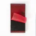 a red and black pillow
