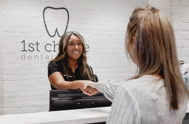 a woman sitting at a computer