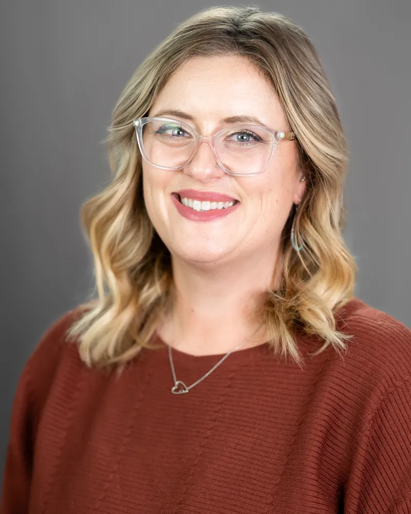 a woman wearing glasses