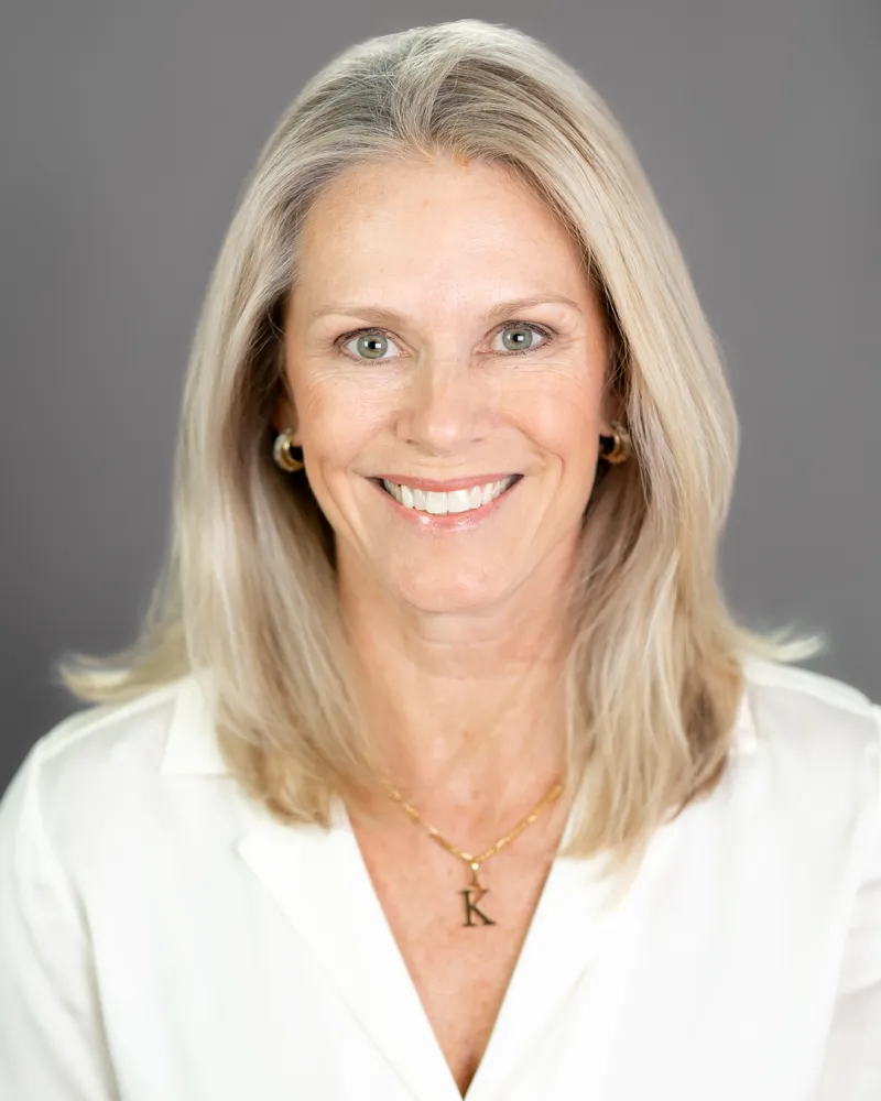 a close-up of a woman smiling